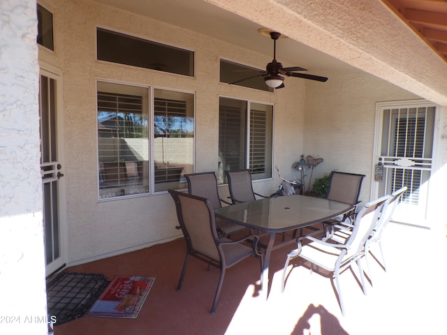 view of patio with ceiling fan