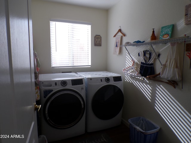 clothes washing area featuring washing machine and clothes dryer