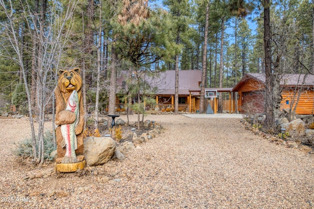 view of front of house featuring a wooden deck