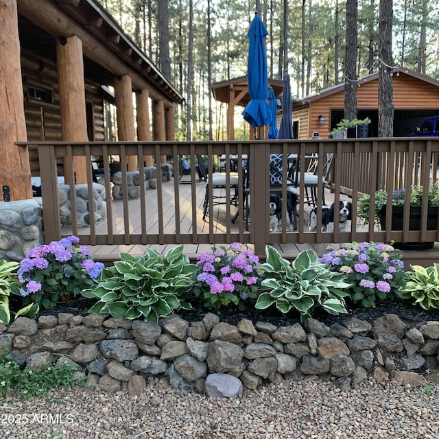 exterior space featuring a wooden deck