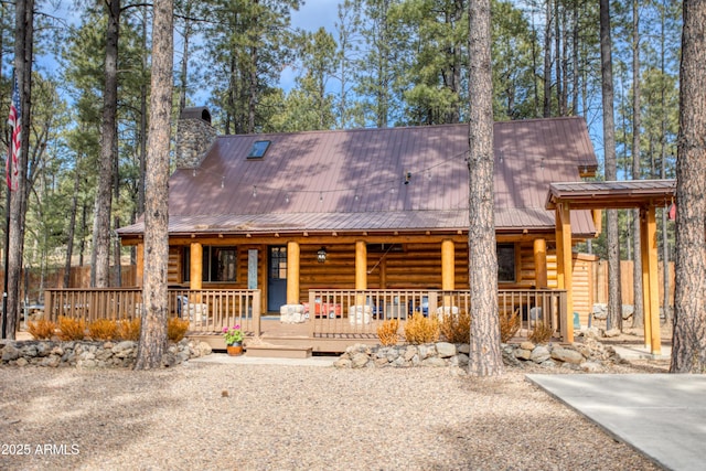 view of log cabin