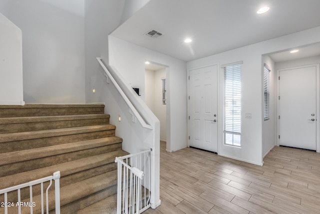 entrance foyer with light wood-type flooring