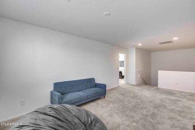 sitting room with light colored carpet