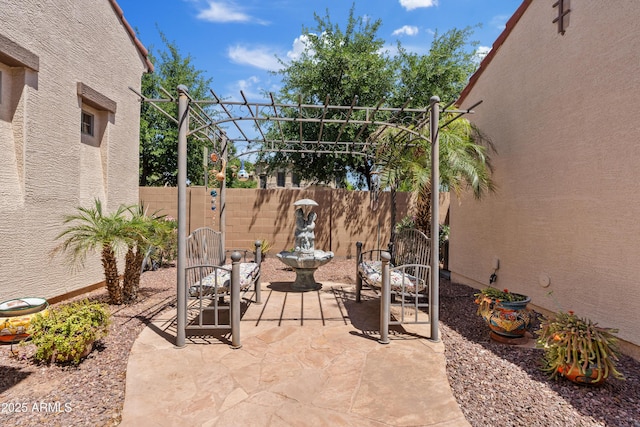 view of patio with fence