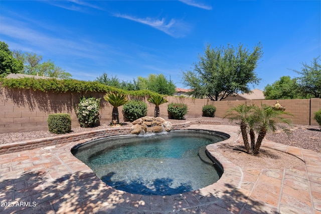 view of pool with a fenced in pool and a fenced backyard