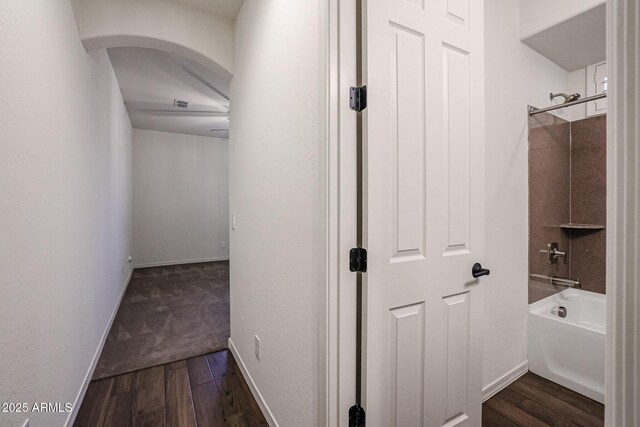 bathroom featuring vanity, hardwood / wood-style floors, and a shower with door