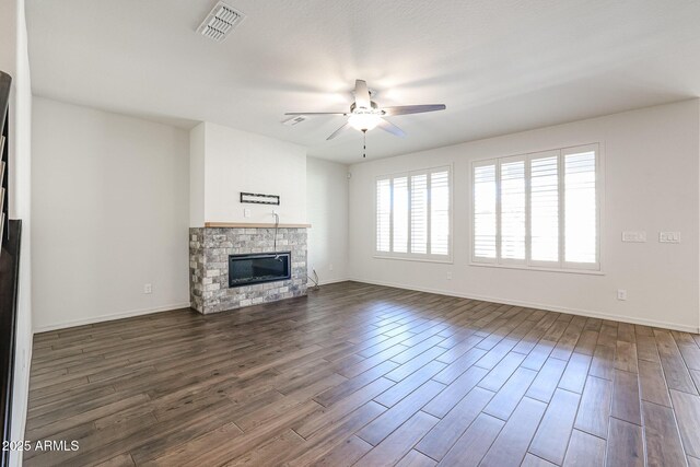 spare room with ceiling fan and dark wood-type flooring