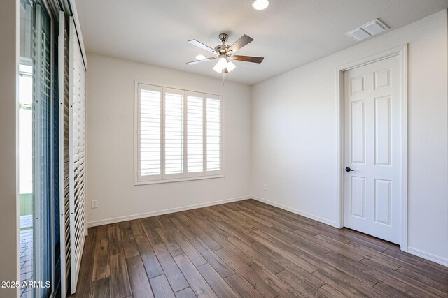 office with dark hardwood / wood-style flooring