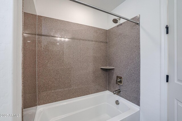 bathroom with shower / bathtub combination with curtain