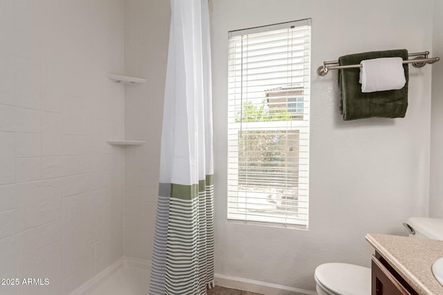 18219 N 19th St, Phoenix, AZ 85022 - full bathroom with toilet, vanity, tiled shower, and baseboards