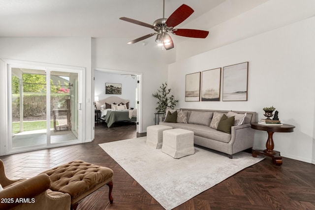 18219 N 19th St, Phoenix, AZ 85022 - living room featuring a ceiling fan, a high ceiling, and baseboards