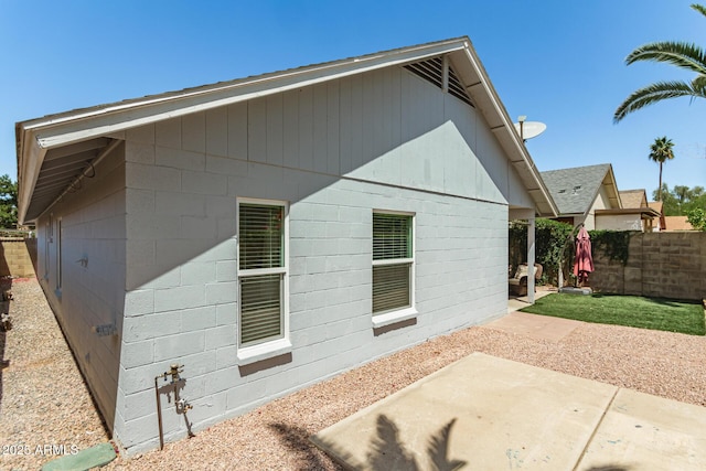 18219 N 19th St, Phoenix, AZ 85022 - rear view of house featuring a patio, fence, and concrete block siding