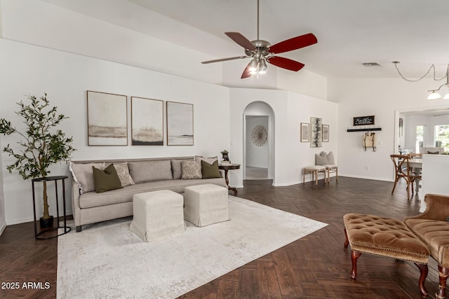 18219 N 19th St, Phoenix, AZ 85022 - living area with arched walkways, a ceiling fan, baseboards, and lofted ceiling