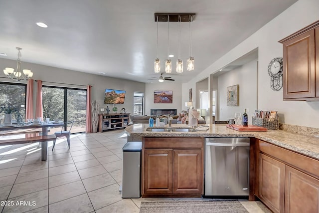 33 Monterey Cir, Sedona, AZ 86351 - kitchen with dishwasher, a sink, a chandelier, a peninsula, and open floor plan