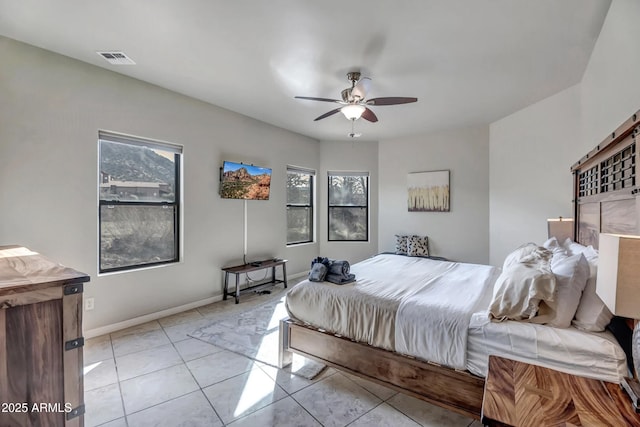 33 Monterey Cir, Sedona, AZ 86351 - bedroom featuring a ceiling fan, light tile patterned floors, and baseboards