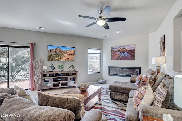 33 Monterey Cir, Sedona, AZ 86351 - tiled living room featuring ceiling fan and baseboards