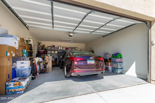 garage featuring a garage door opener