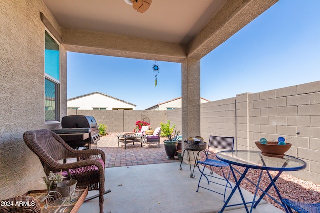 view of patio with a grill