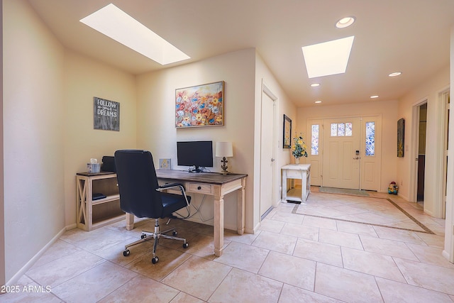 home office featuring light tile patterned flooring, baseboards, a skylight, and recessed lighting