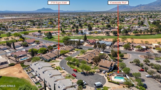 bird's eye view featuring a mountain view and a residential view