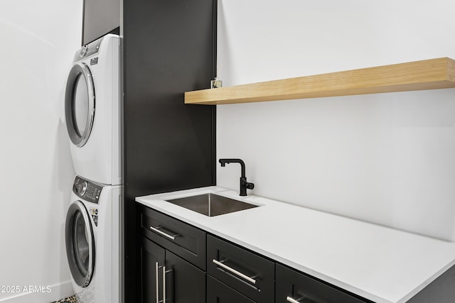 4002 N 33rd Pl, Phoenix, AZ 85018 - clothes washing area featuring stacked washer and clothes dryer and cabinet space