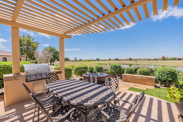 view of terrace featuring a pergola and grilling area