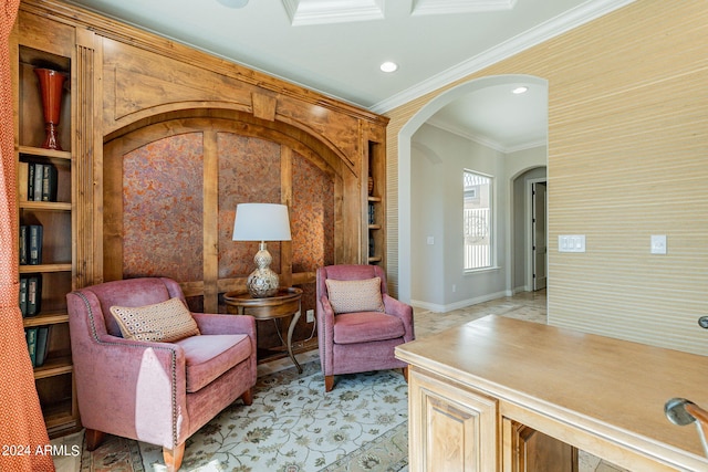 living area featuring tile floors and crown molding