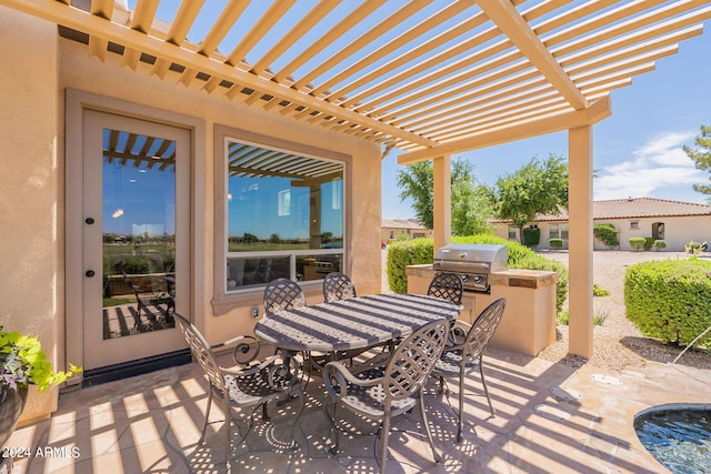 view of patio / terrace featuring a pergola and area for grilling