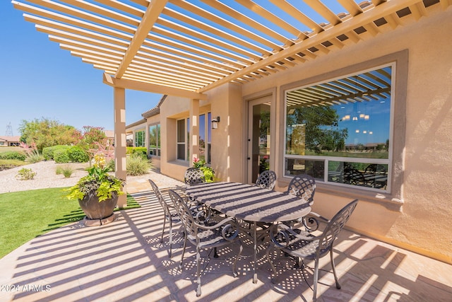 view of terrace with a pergola