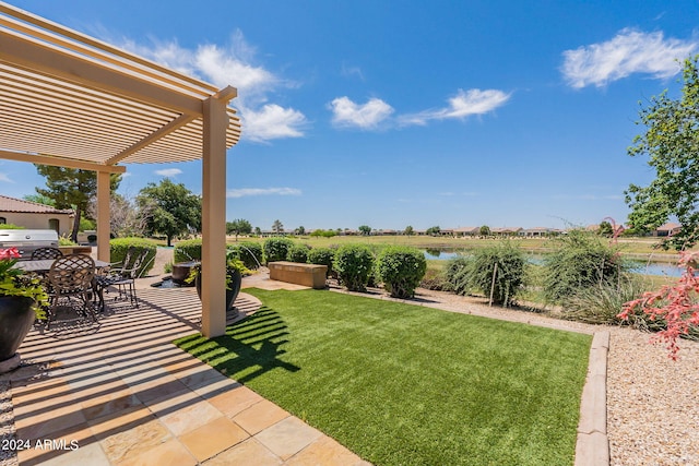 view of yard with a pergola and a patio