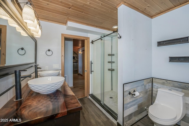 4177 W Finch Hollow Ave, Chino Valley, AZ 86323 - full bath with toilet, wood finished floors, a shower stall, wooden ceiling, and vanity