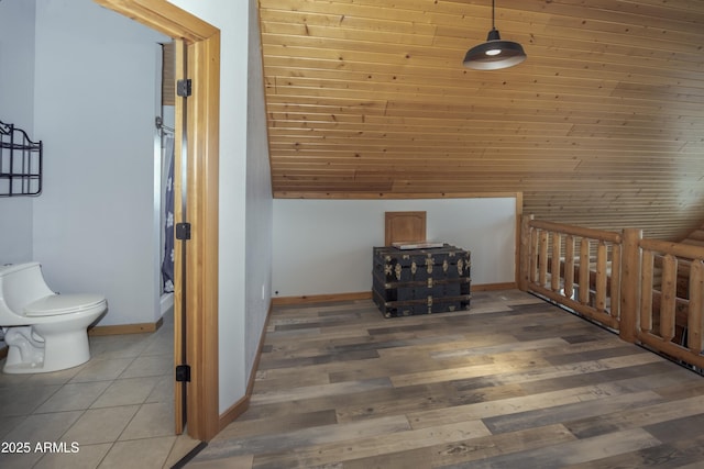 4177 W Finch Hollow Ave, Chino Valley, AZ 86323 - additional living space featuring lofted ceiling, light wood-style flooring, and baseboards