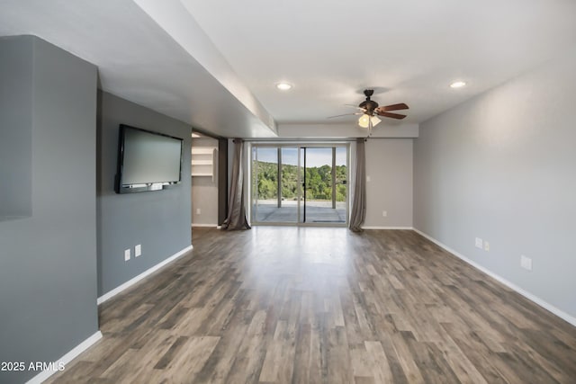 4177 W Finch Hollow Ave, Chino Valley, AZ 86323 - unfurnished living room featuring recessed lighting, wood finished floors, baseboards, and ceiling fan