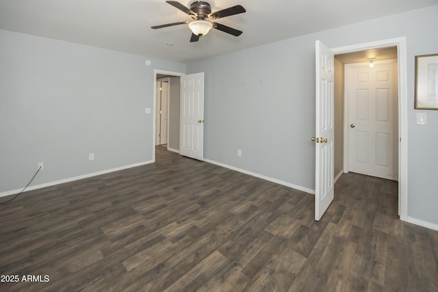 4177 W Finch Hollow Ave, Chino Valley, AZ 86323 - unfurnished bedroom with a ceiling fan, baseboards, and dark wood-style floors