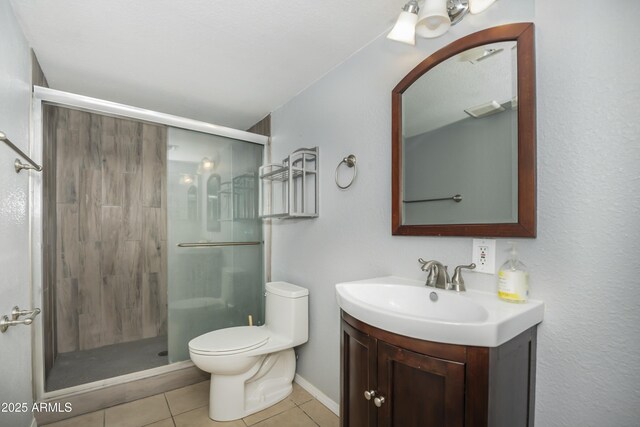 4177 W Finch Hollow Ave, Chino Valley, AZ 86323 - bathroom with tile patterned floors, toilet, a stall shower, visible vents, and vanity