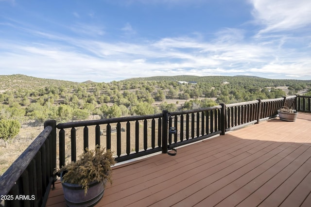 4177 W Finch Hollow Ave, Chino Valley, AZ 86323 - wooden terrace featuring a forest view and a mountain view