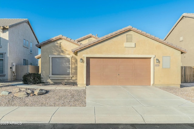 view of front of home with a garage