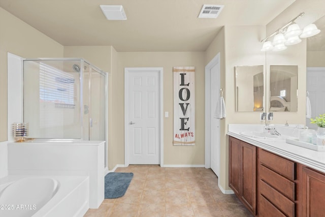 bathroom featuring vanity, tile patterned floors, and independent shower and bath