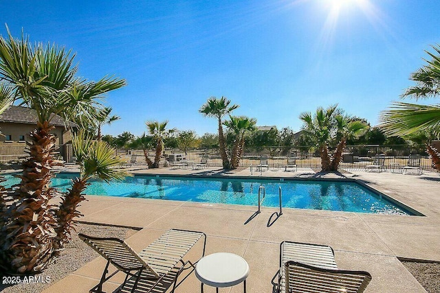 view of swimming pool featuring a patio