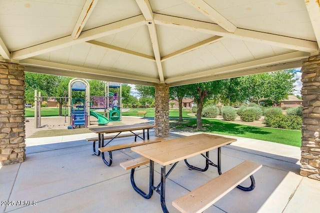 view of patio / terrace with a gazebo and a playground