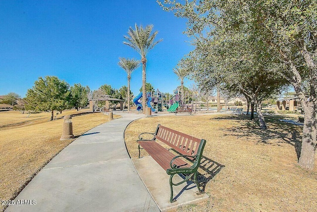 view of property's community with a playground