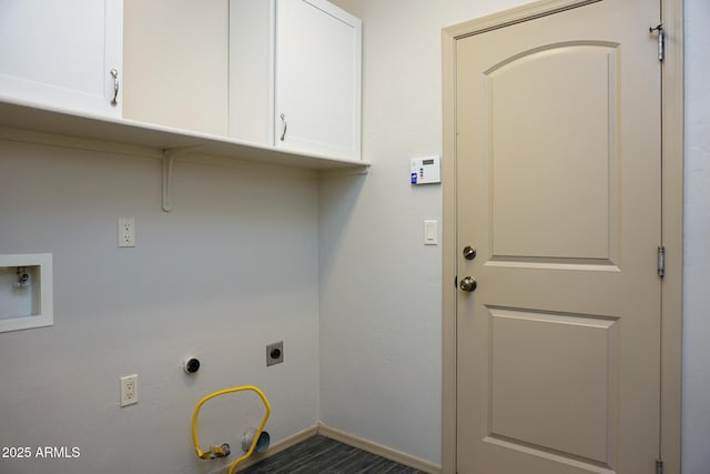 laundry room with cabinet space, baseboards, washer hookup, and electric dryer hookup