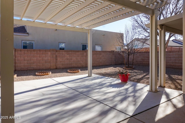 view of patio featuring a fenced backyard and a pergola