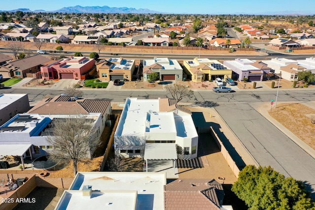 bird's eye view with a residential view and a mountain view