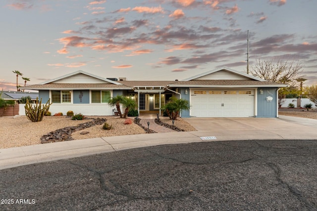 single story home featuring a garage