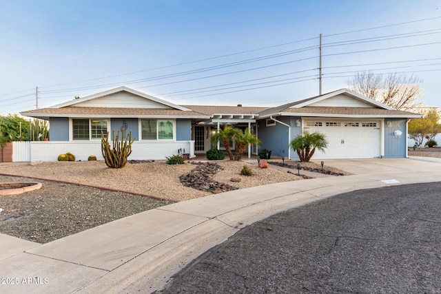 ranch-style home with a garage