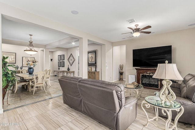 living room with ceiling fan