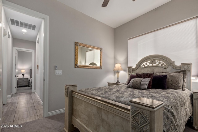 bedroom with ceiling fan and carpet flooring