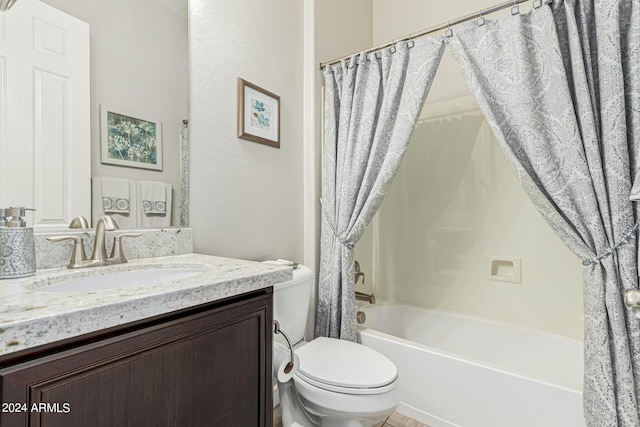 full bathroom featuring toilet, vanity, and shower / bath combo