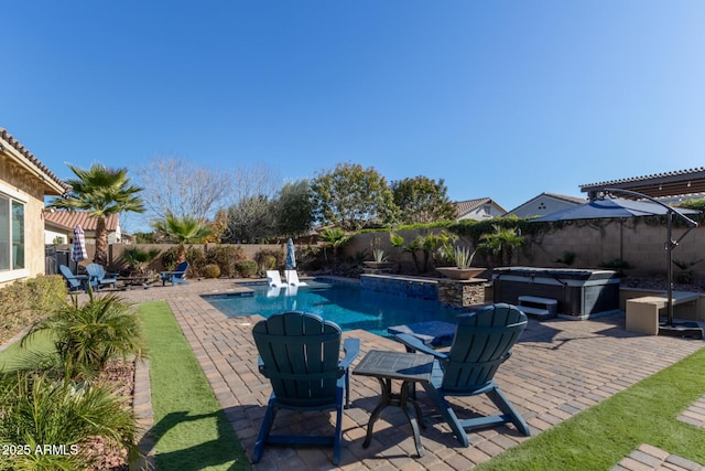 view of swimming pool with a patio, a hot tub, and a pergola